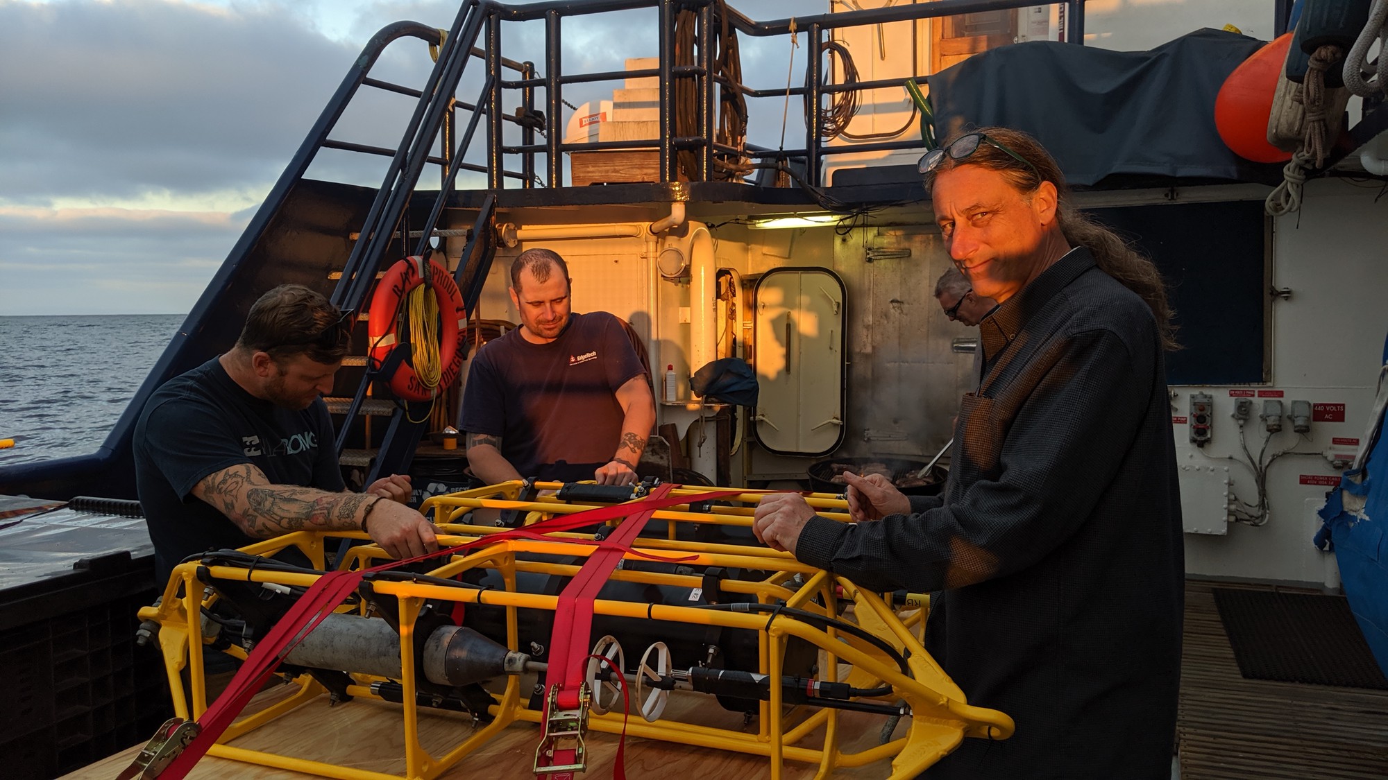 The WHOI team inspecting the recovered MAVS instruments.